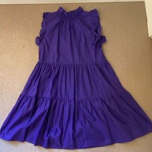Felicite smocked midi tiered dress. Sateen cotton in deep purple. Ruffled neck